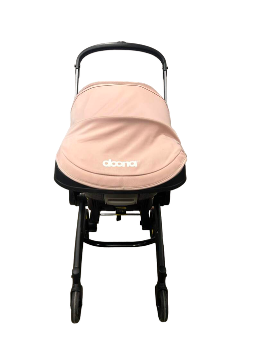 used Doona Infant Car Seat & Stroller Combo, 2021, Blush Pink