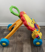 secondhand Fisher Price Musical Lion Walker