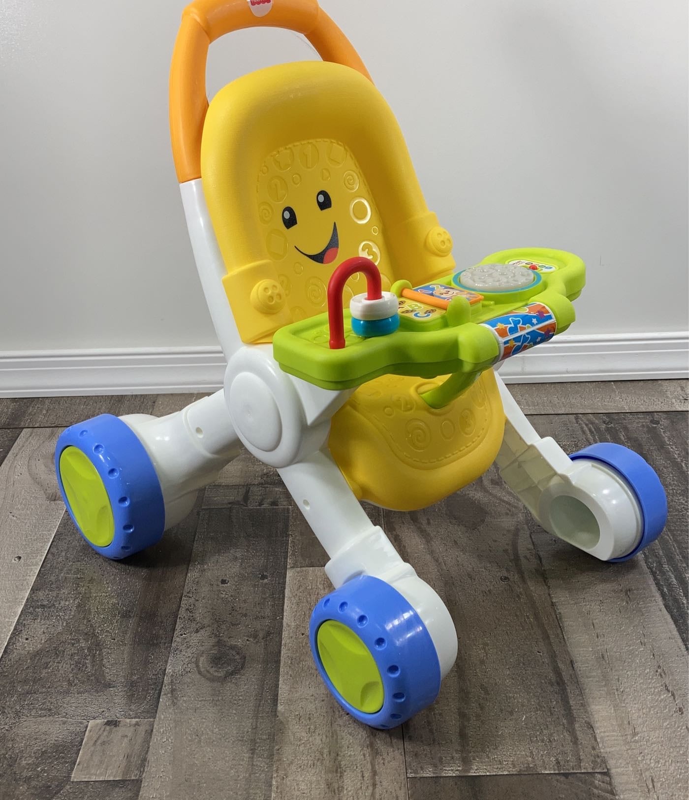 Fisher price stroll and learn hot sale walker yellow