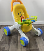 secondhand Fisher Price Stroll & Learn Walker