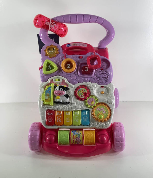 used VTech Sit-To-Stand Learning Walker, - pink