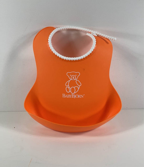 Shop BabyBjorn Bib, Orange at GoodBuy Gear