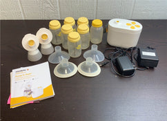 used Medela Pump In Style with MaxFlow, (21mm & 24mm Flanges)