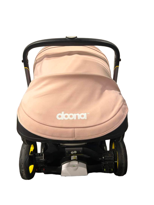 used Doona Infant Car Seat & Stroller Combo, 2021, Blush Pink