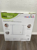 used Munchkin Auto Close Metal Baby Gate