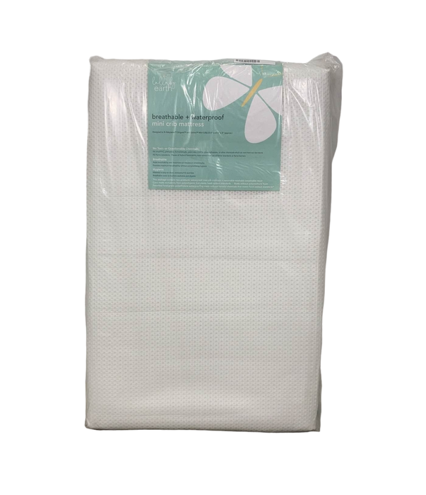 used Lullaby Earth Breeze Mini Crib Mattress