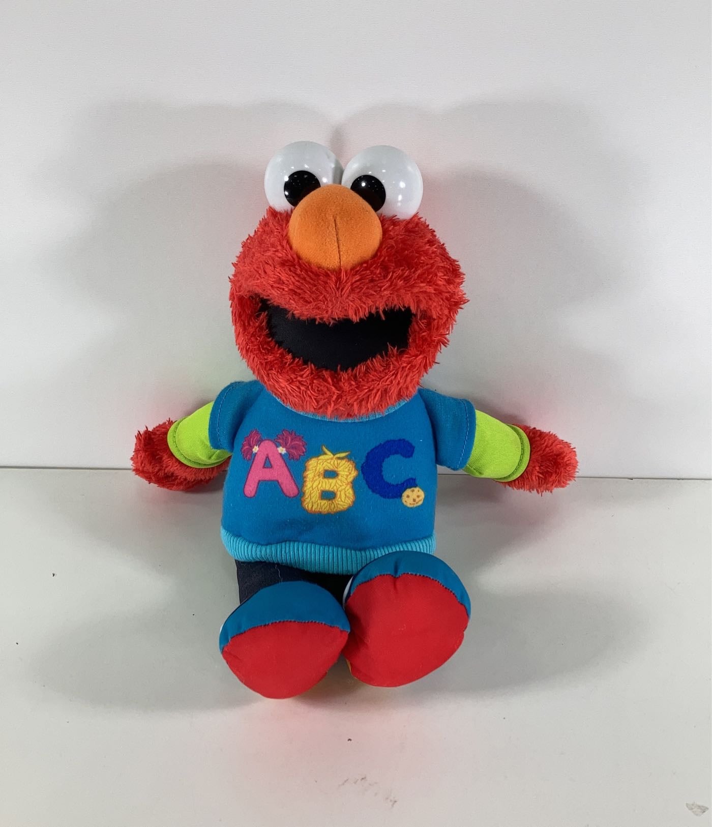 Sesame street talking sales abc elmo figure