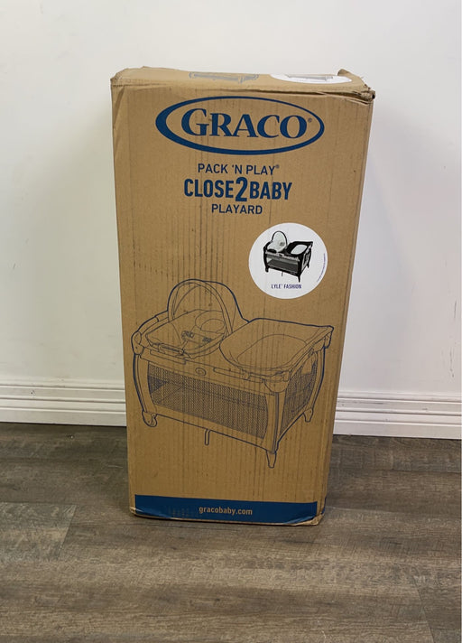 used Graco Pack 'n Play Close2Baby Bassinet Playard, Lyle