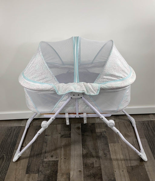 used Delta Children EZ Fold Ultra Compact Travel Bassinet