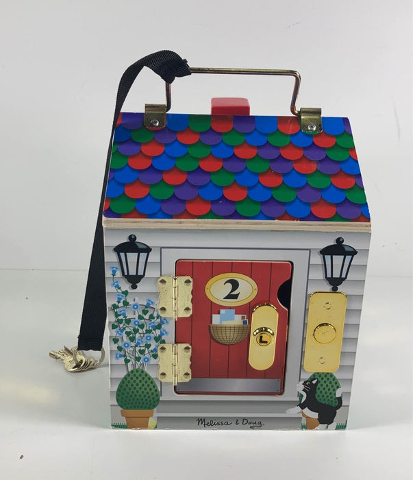 used Melissa & Doug Take-Along Wooden Doorbell Dollhouse