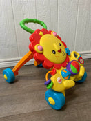 secondhand Fisher Price Musical Lion Walker