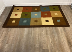 secondhand At Home Area Rug