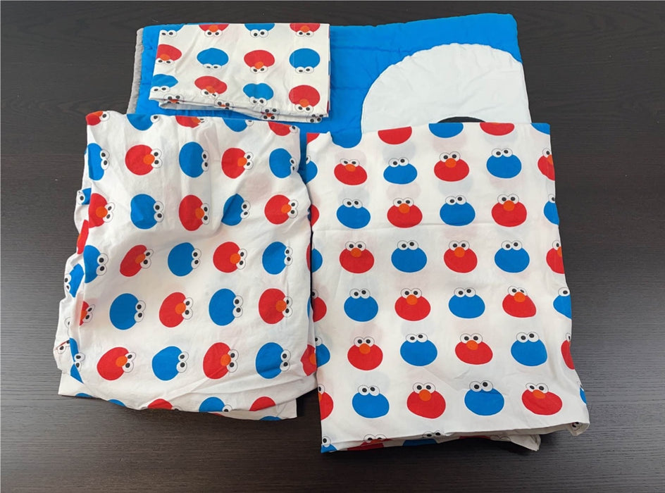 used Sesame Street Elmo/cookie Monster Crib Bedding