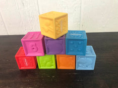 used Infantino Squeeze & Stack Block Set