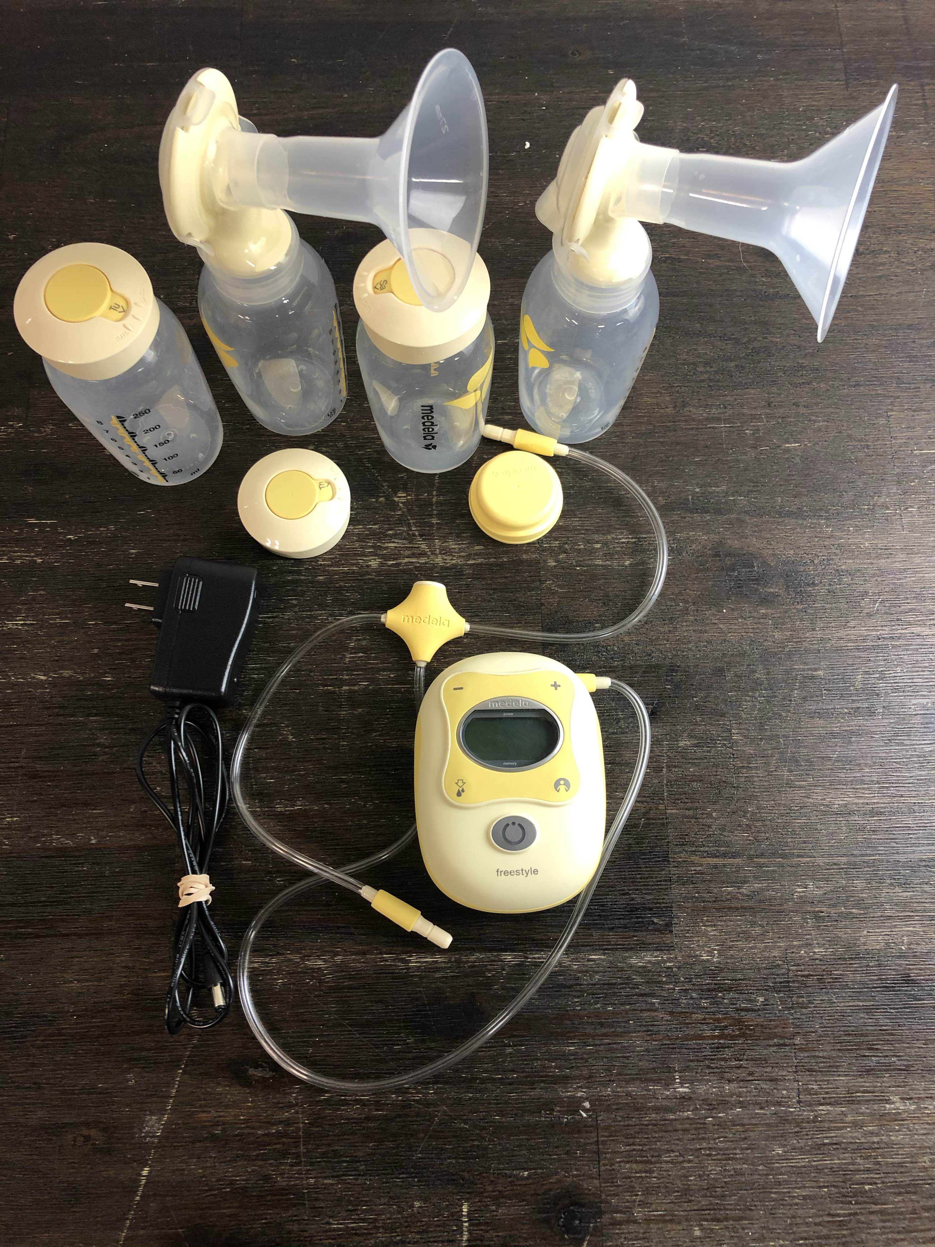 Medela Freestyle Flex Breast Pump, Closed System Quiet Handheld Portable  Double Electric Breastpump, Mobile Connected Smart Pump with Touch Screen  LED