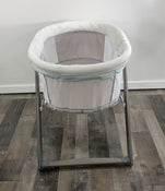 used Ingenuity Foldaway Rocking Wood Bassinet