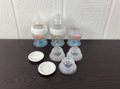 used Munchkin Latch System Bottles