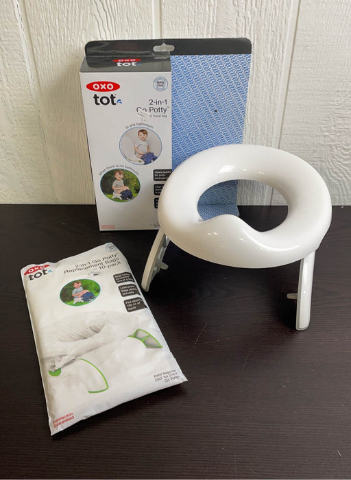 used OXO Tot 2-in-1 Go Potty, With replacement bags