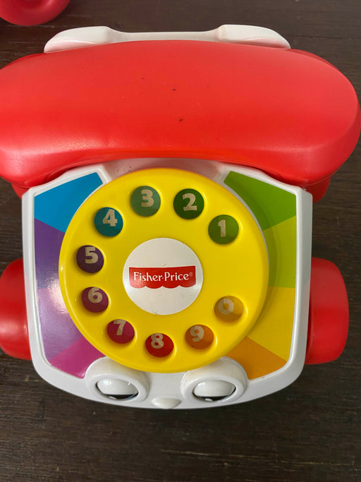 secondhand Fisher Price Chatter Telephone, And Dog Pull toy 