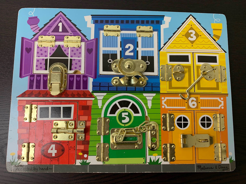 used Melissa & Doug Latches Board