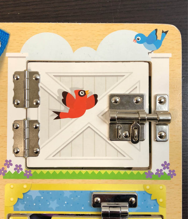 used Melissa & Doug Latches Board