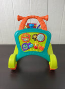 used Bright Starts Sit-to-Stride Activity Walker