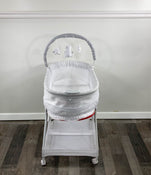 secondhand Delta Children Wave Vibrating Bassinet With Toy Bar