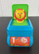 secondhand Fisher Price Spin ‘n Surprise Lion