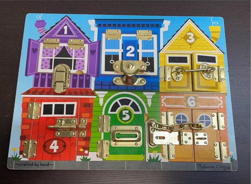 used Melissa & Doug Latches Board