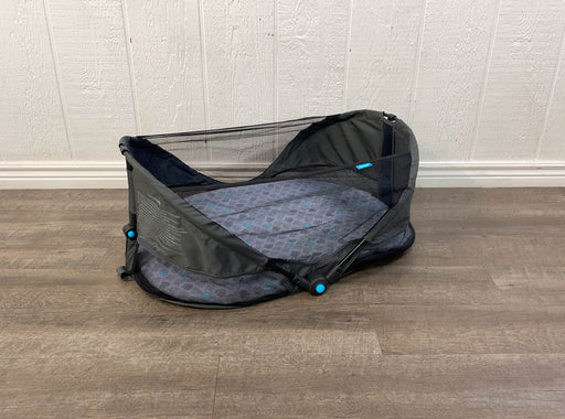 used Munchkin Brica Fold ‘n Go Travel Bassinet