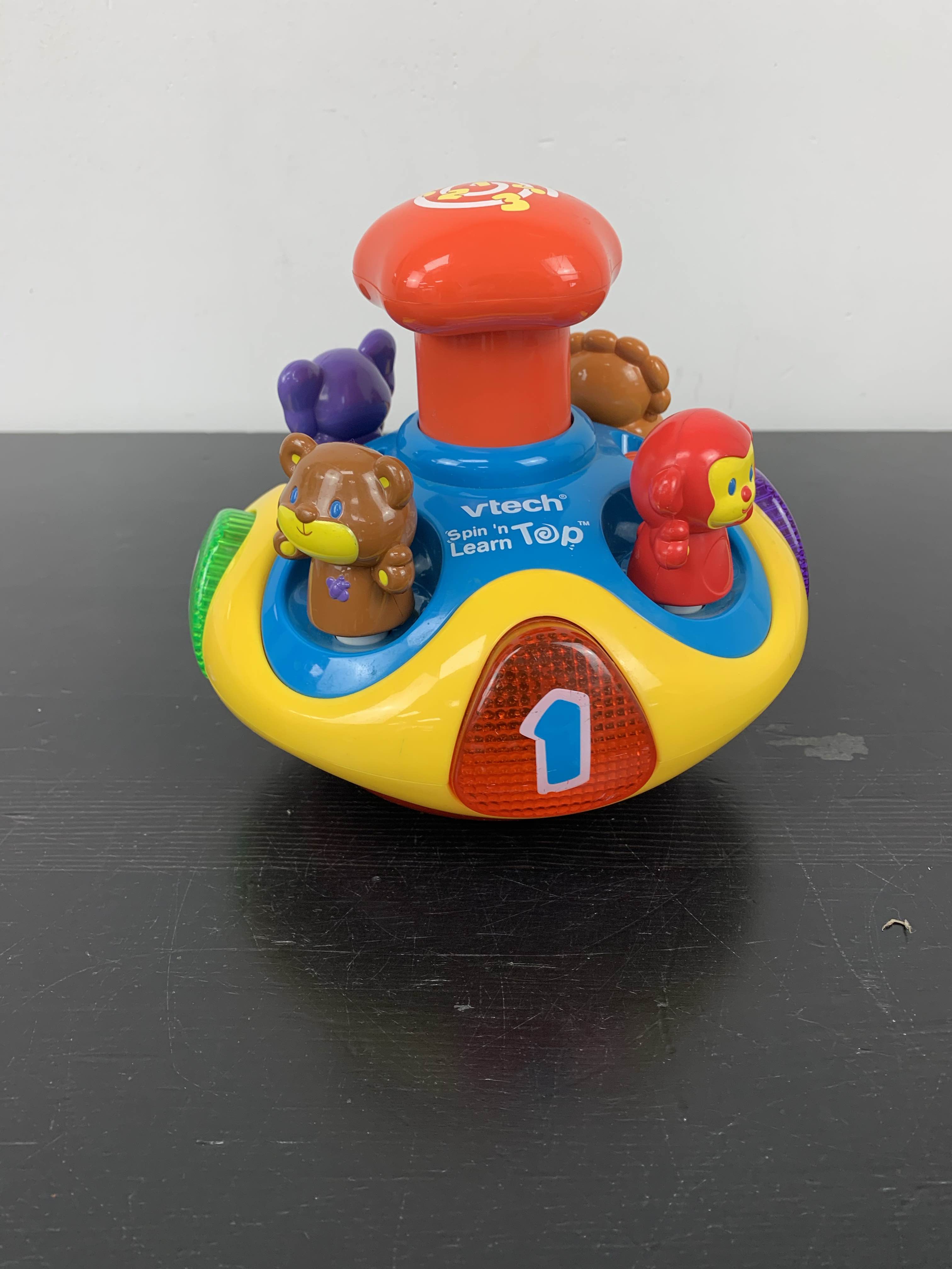 Vtech spin n store learn top