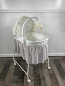 used Delta Children Deluxe Gliding Bassinet