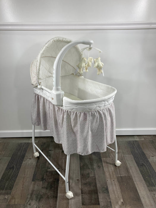 used Delta Children Deluxe Gliding Bassinet