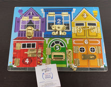 used Melissa & Doug Latches Board