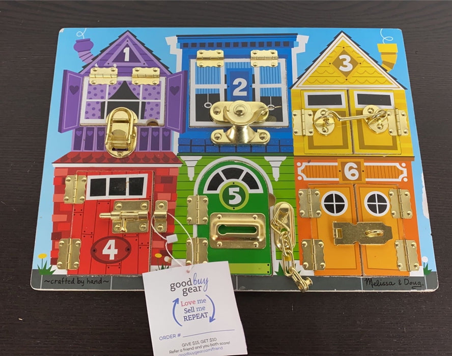 used Melissa & Doug Latches Board