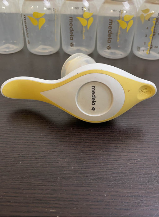 Shop Medela Harmony Manual Breast Pump with Storage Bottles at GoodBuy Gear