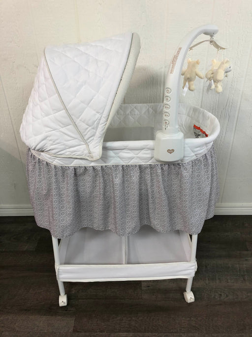 secondhand Delta Children Deluxe Gliding Bassinet