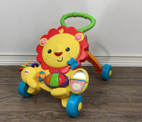 used Fisher Price Musical Lion Walker