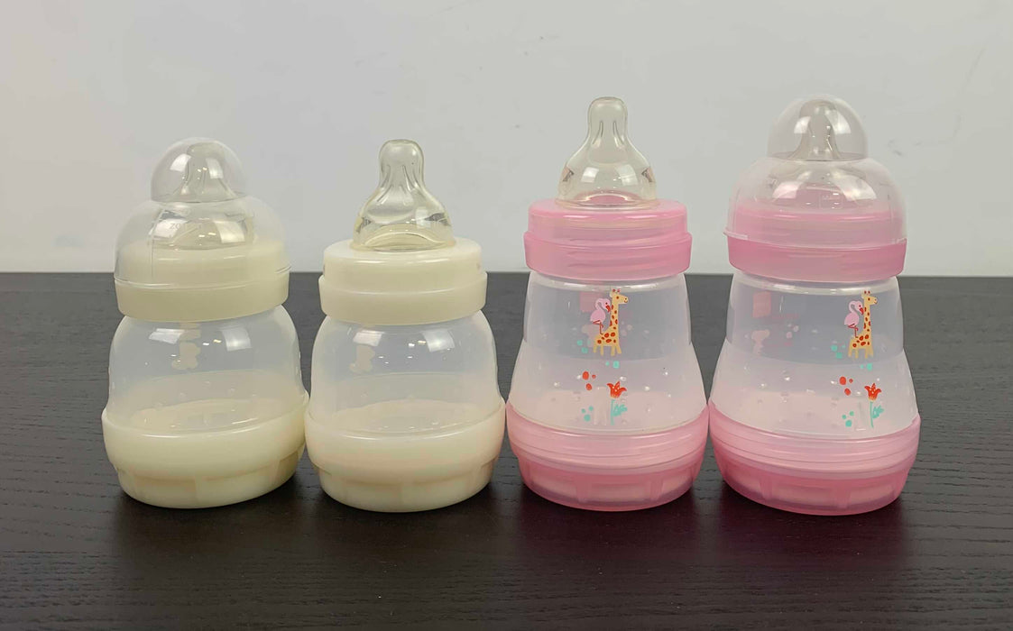 used BUNDLE MAM Baby Bottles