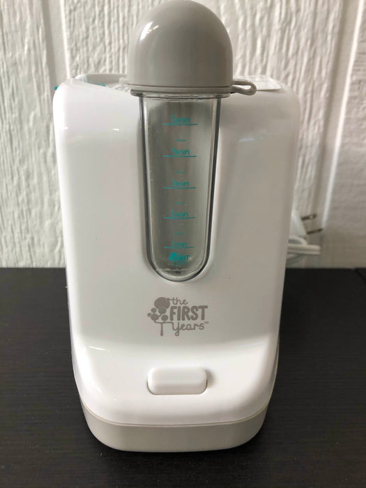 used The First Years 2 In 1 Simple Serve Bottle Warmer