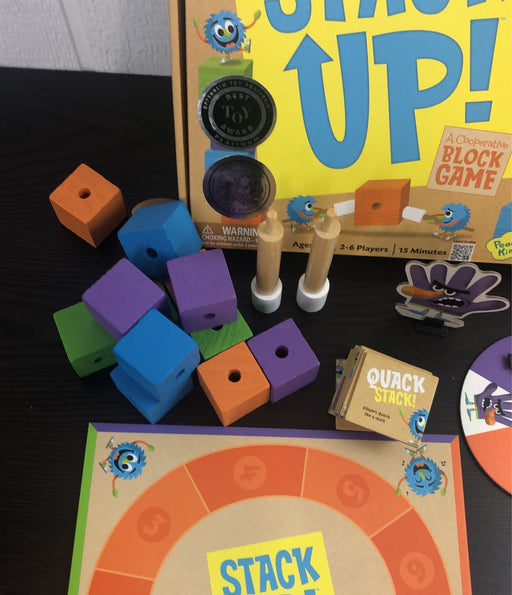 secondhand Peaceable Kingdom Stack Up!