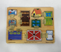 used Melissa & Doug Hide And Seek Activity Board