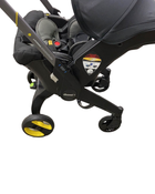 used Doona Infant Car Seat & Stroller Combo, 2023, Nitro Black