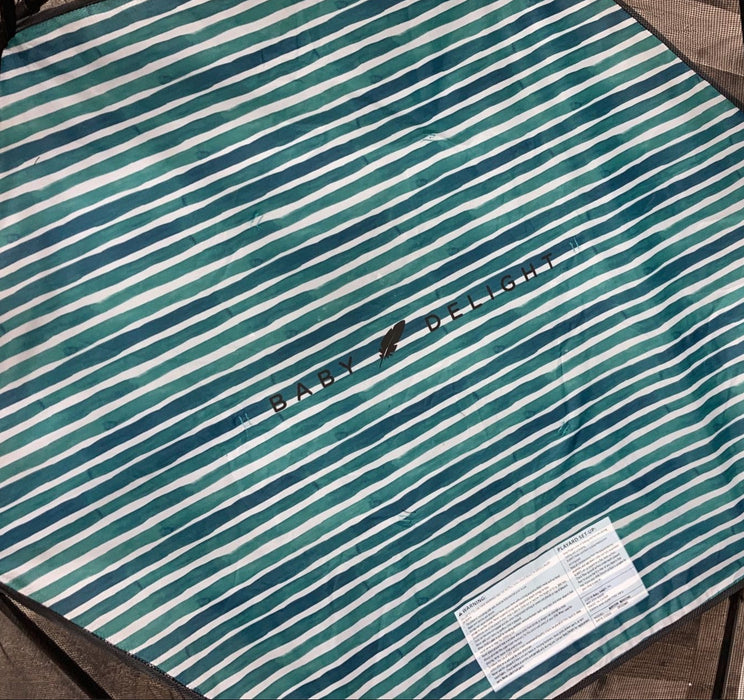 Shop Baby Delight Go With Me Eclipse Portable Playard, Regular, Watercolor Stripe with Grey Canopy at GoodBuy Gear