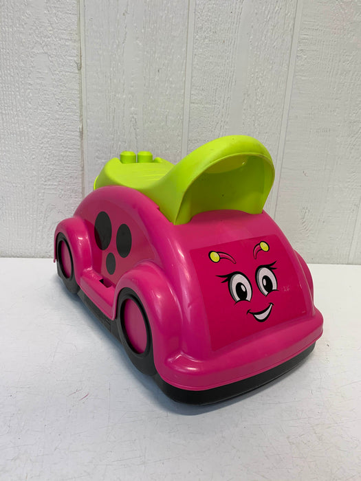 used Mega Bloks Ride-On Whirl ‘n Twirl Race Car, Pink