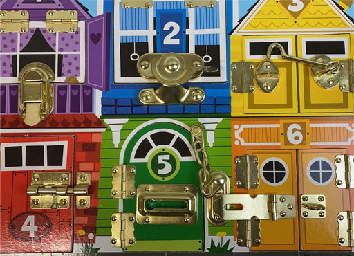 secondhand Melissa & Doug Latches Board