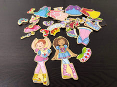 used T.S. Shure Daisy Girls Wooden Magnetic Dress-Up Dolls