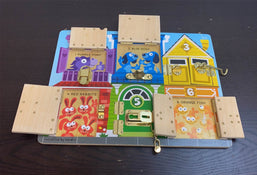 secondhand Melissa & Doug Latches Board