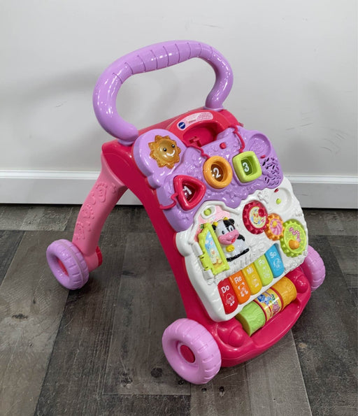 used VTech Sit-To-Stand Learning Walker, - pink