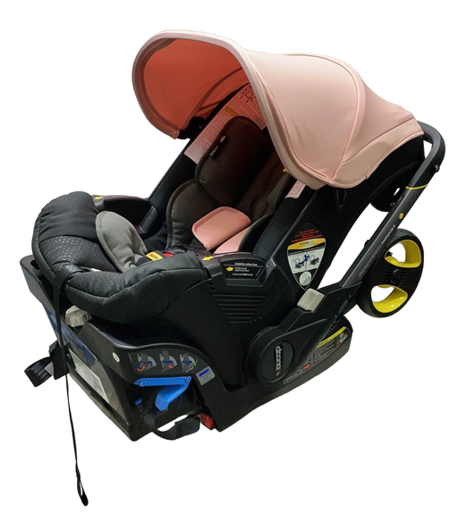 used Doona Infant Car Seat & Stroller Combo, Blush Pink, 2023